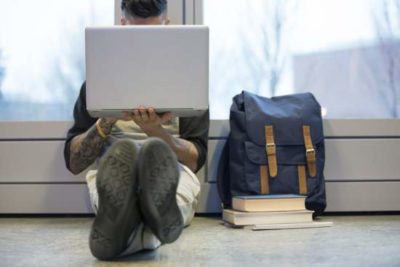 Blog_student-sitting-laptop-backpack